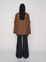 Tailored poncho with front flap pocket and double sleeves