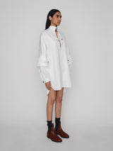 Tailored oversized cotton shirtdress with high collar and double sleeves