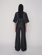 Wide leg tailored denim trousers with cuff details on the hem